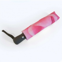 Pink folding umbrella